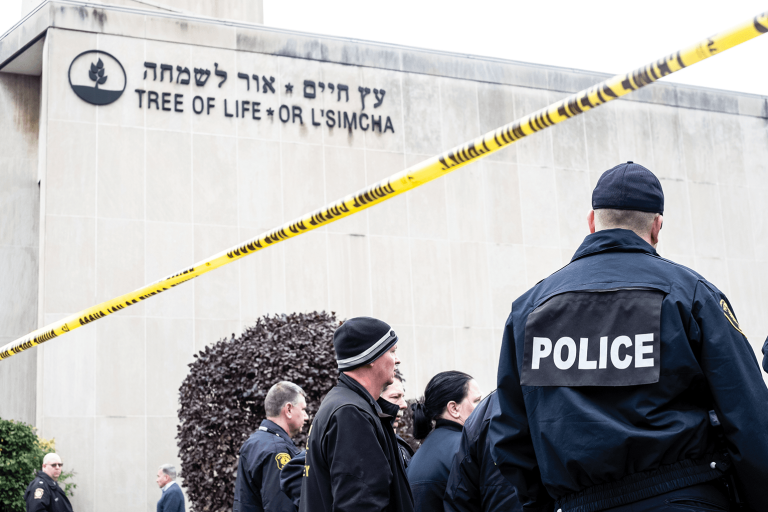 Photo of police standing outside Tree of Life synagogue