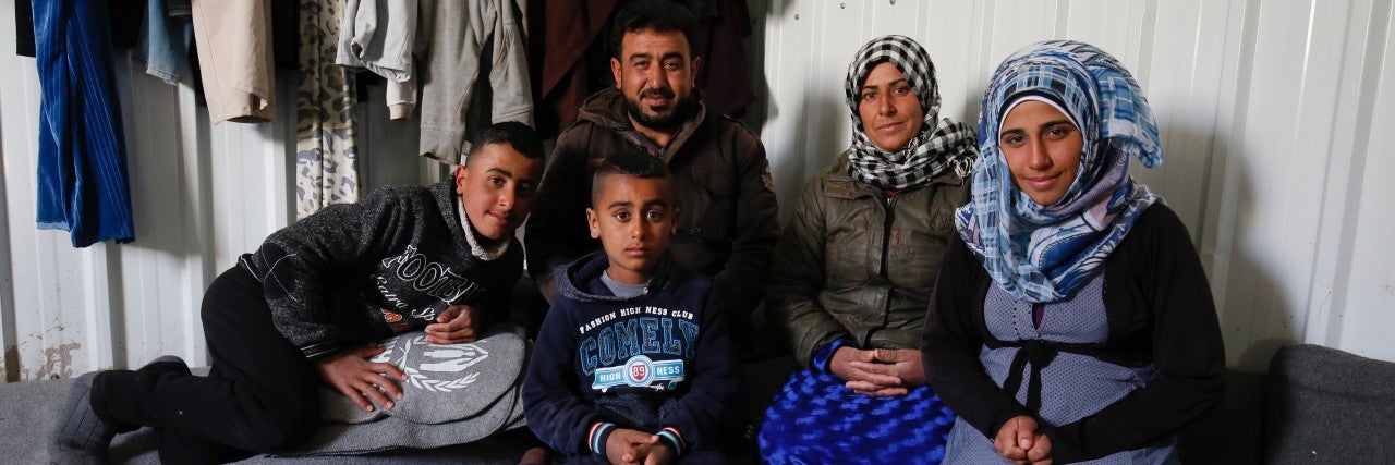 Photo of a Syrian refugee family in the Azraq camp in northern Jordan