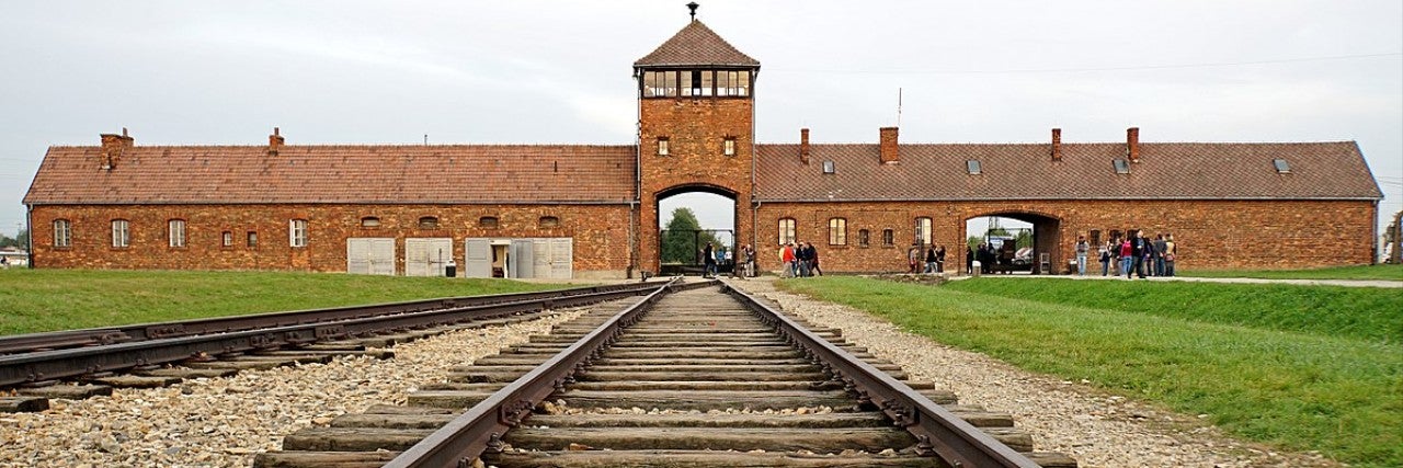 Photo of train tracks leading to Auschwitz, Poland