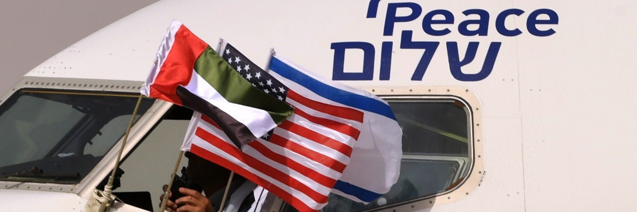 Photo of UAE, USA, and Israel Flags on Airplane