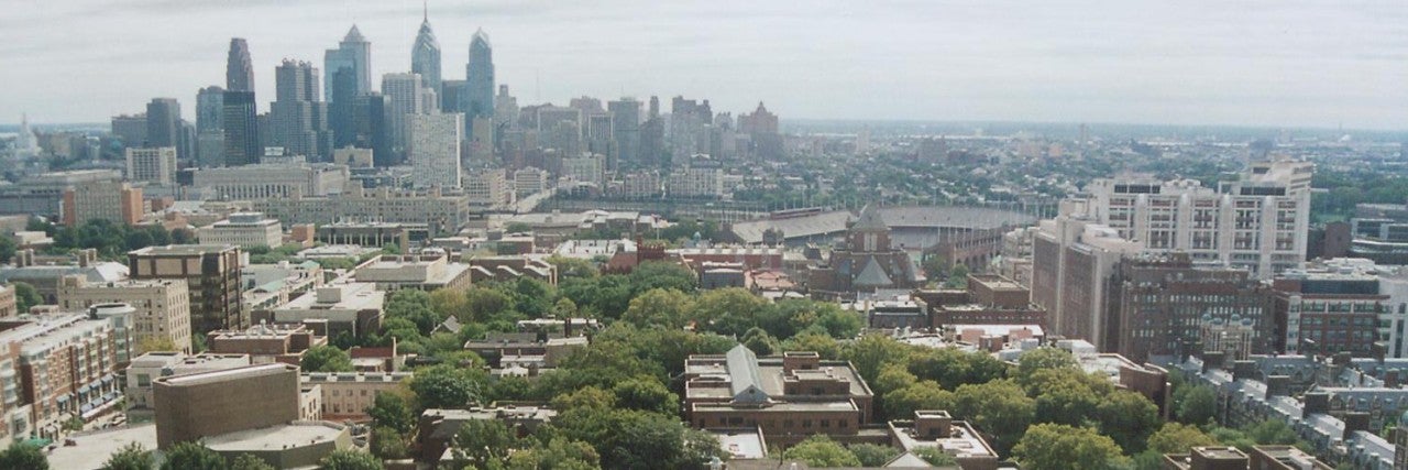 University of Pennsylvania campus buildings from above in the foreground, bird's eye view with the skyline of Philadelphia in the background