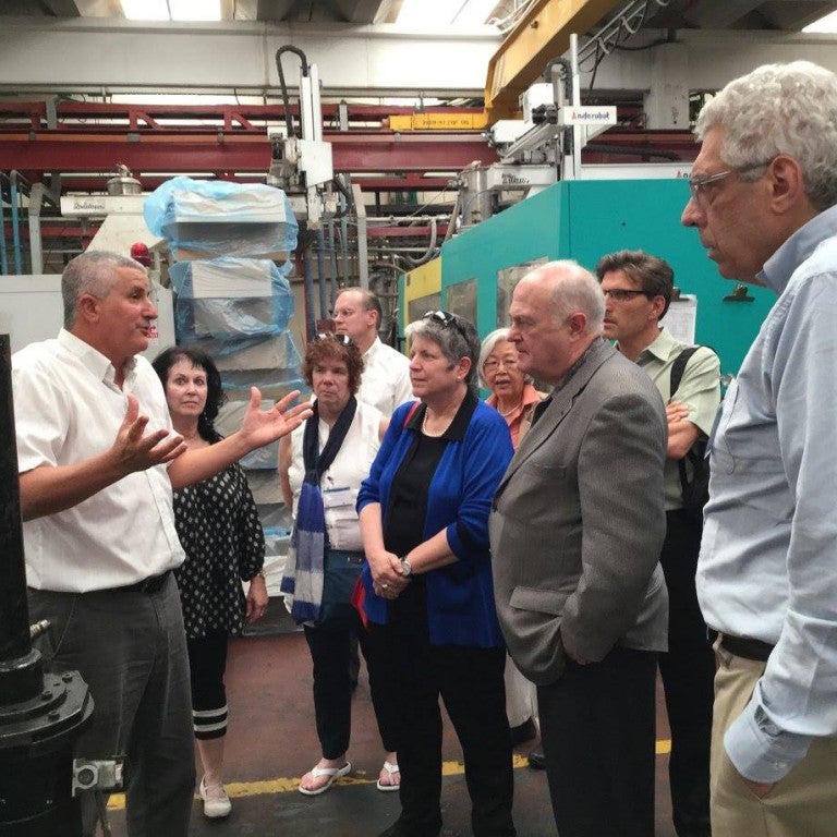 Group of University Alumni visiting a manufacturing plant