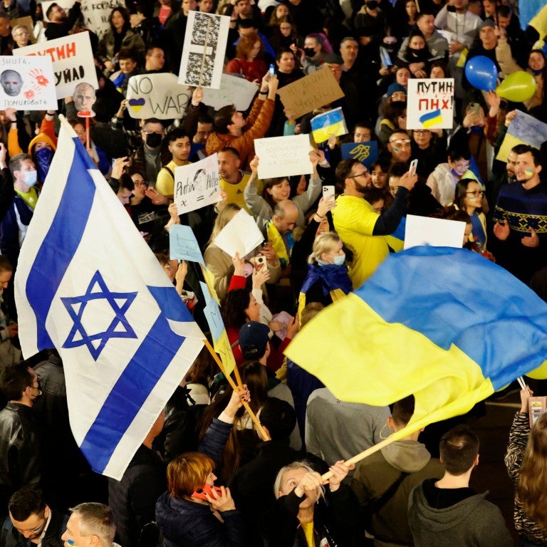 Photo of rally waving Israeli and Ukrainian flags