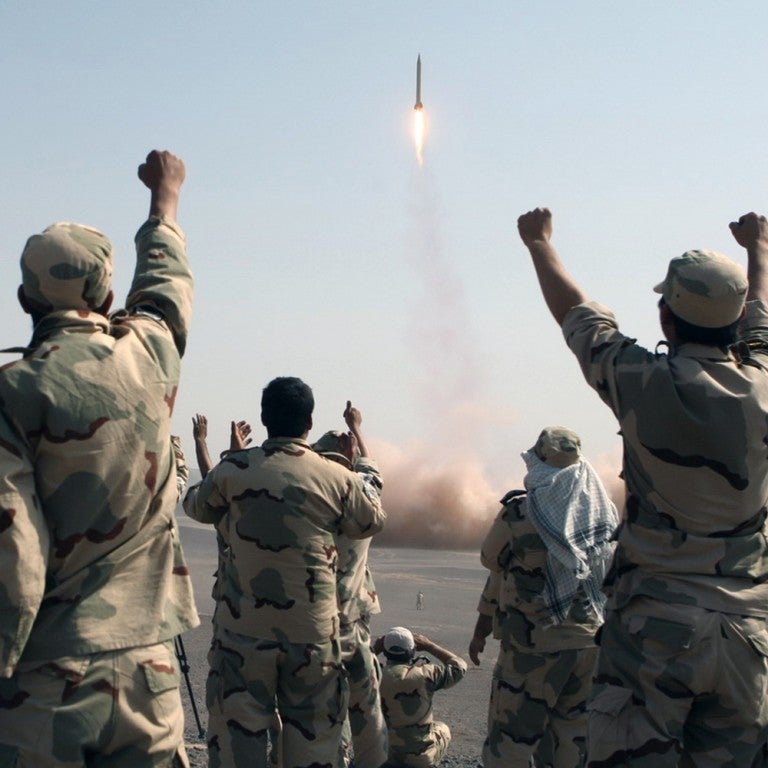 Photo of Iranian Revolutionary Guard cheering as they test ballistic missiles