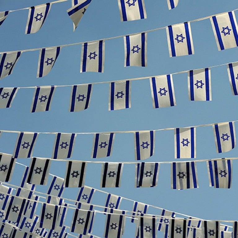 Photo of a series of Israeli flags on a chain